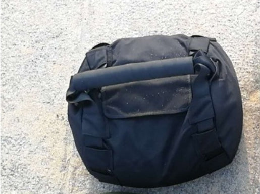 Strongman Throwing Sandbag