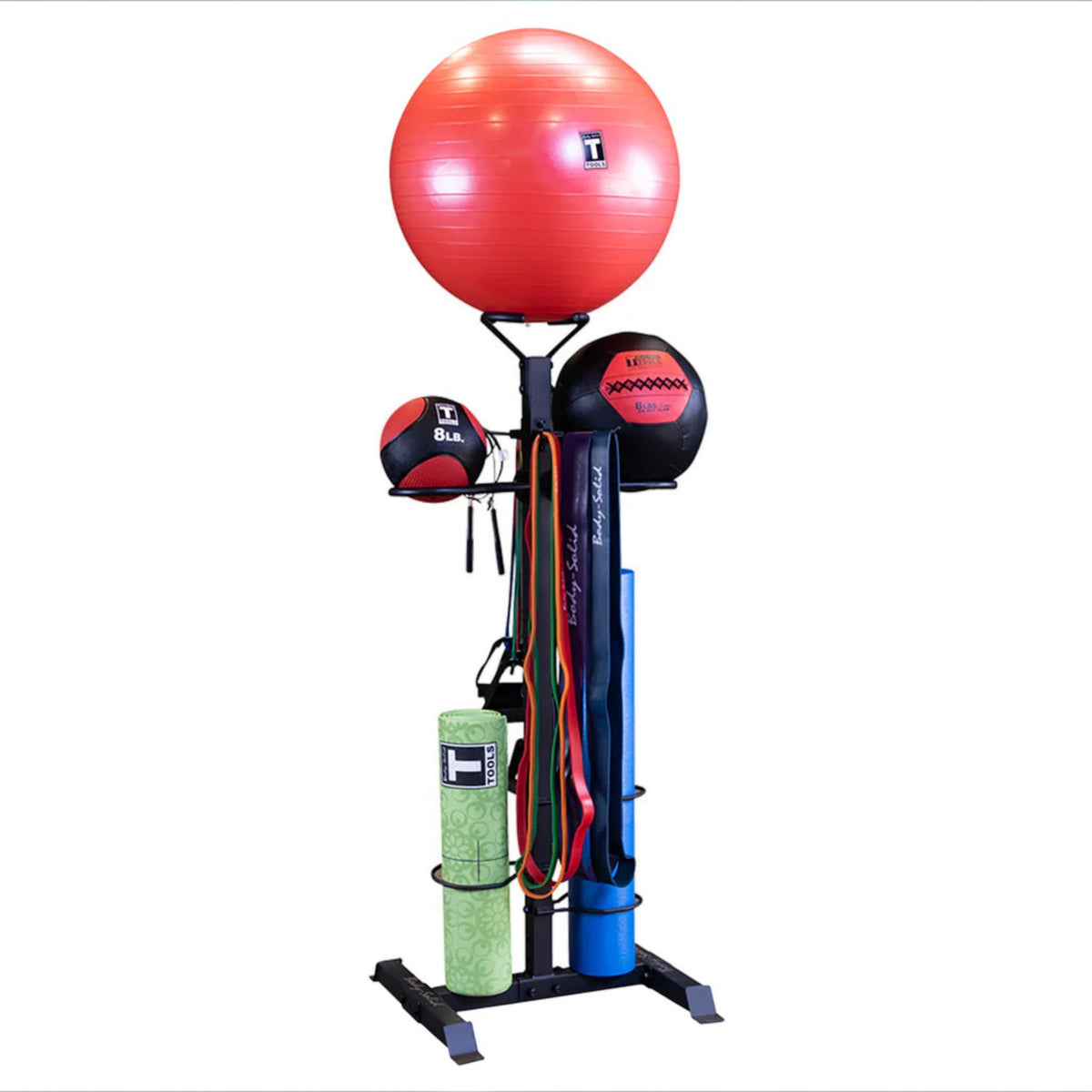 Gymless Body-Solid Compact Accessory Tower holding a stability ball, medicine balls, resistance bands, and yoga mats.