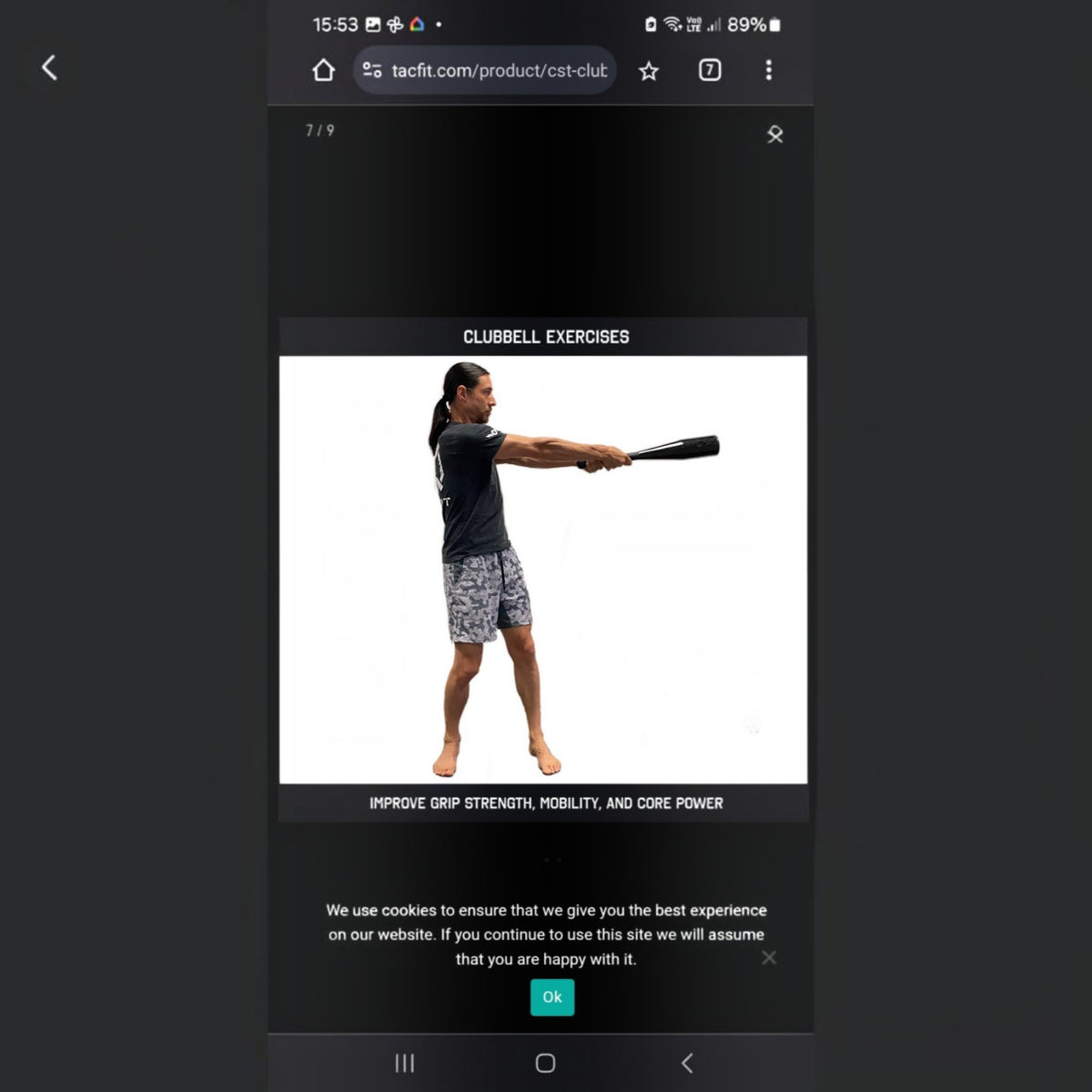 Individual demonstrating Indian clubs exercises for improving grip strength and mobility.