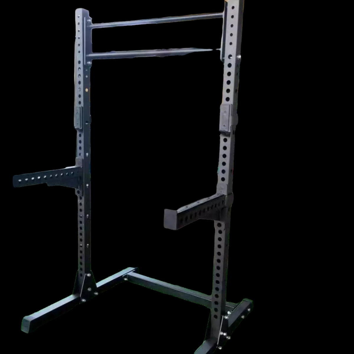 Gymless full commercial half rack with black steel frame, J-hooks, and spotter arms for heavy-duty strength training.