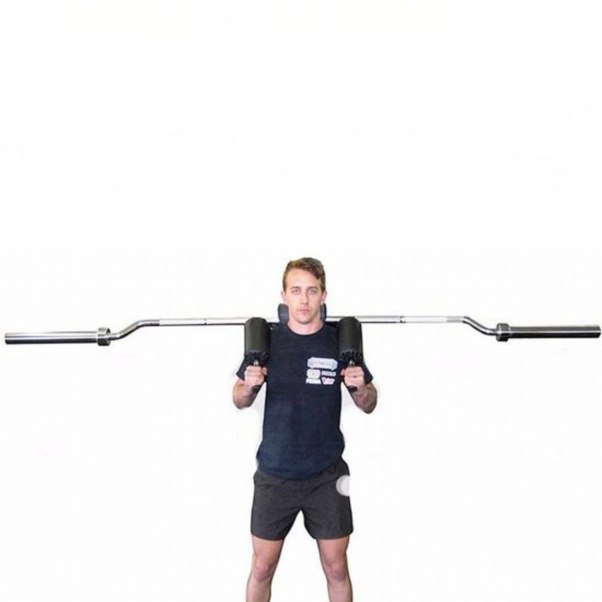 Gymless Olympic safety squat bar with padded shoulder supports and front handles being used by a male athlete