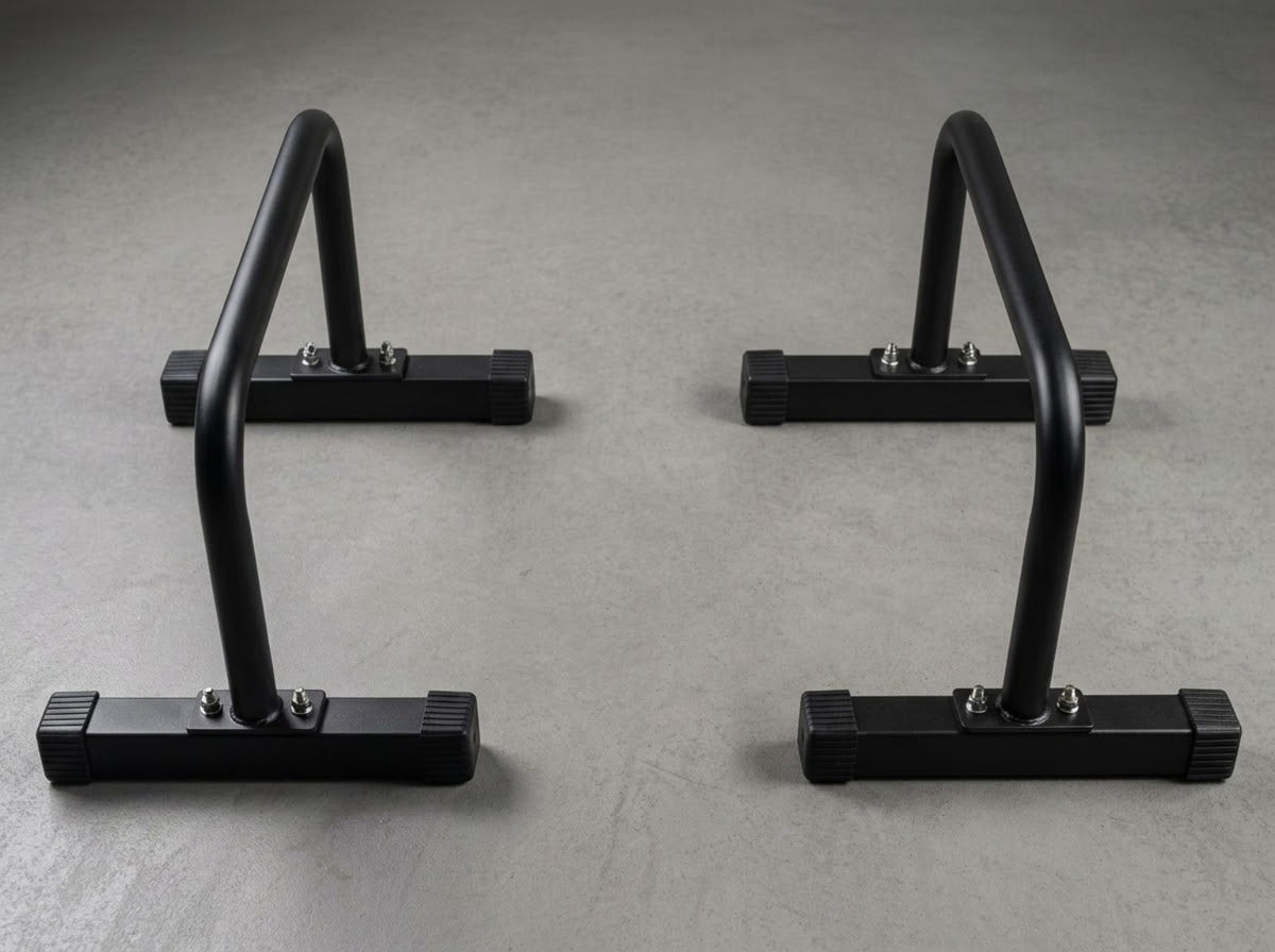 Front view of two separate black Gymless parallettes showing their individual support feet.