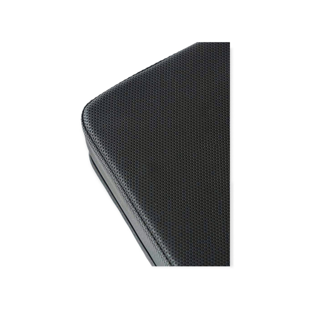 Close-up of the black anti-slip textured pad on a Gymless powerlifting bench for enhanced grip and stability.