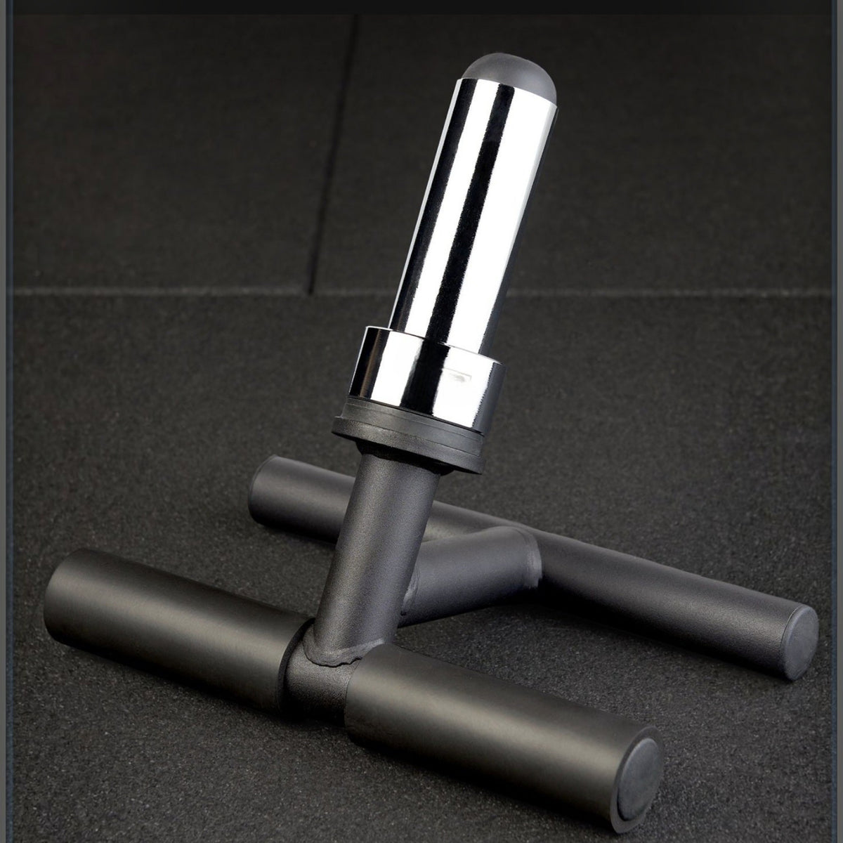 Gymless tib developer bar with a chrome weight plate sleeve and black steel frame for shin muscle training